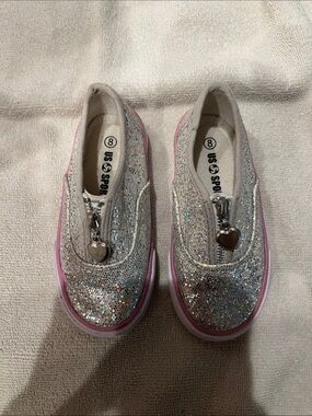 Sparkling Silver Glitter Slip-On Sneakers with Pink Trim and Heart Zipper